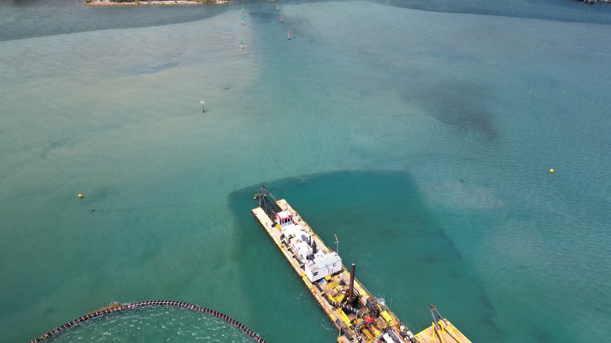 Dredge operations with turbidity monitoring